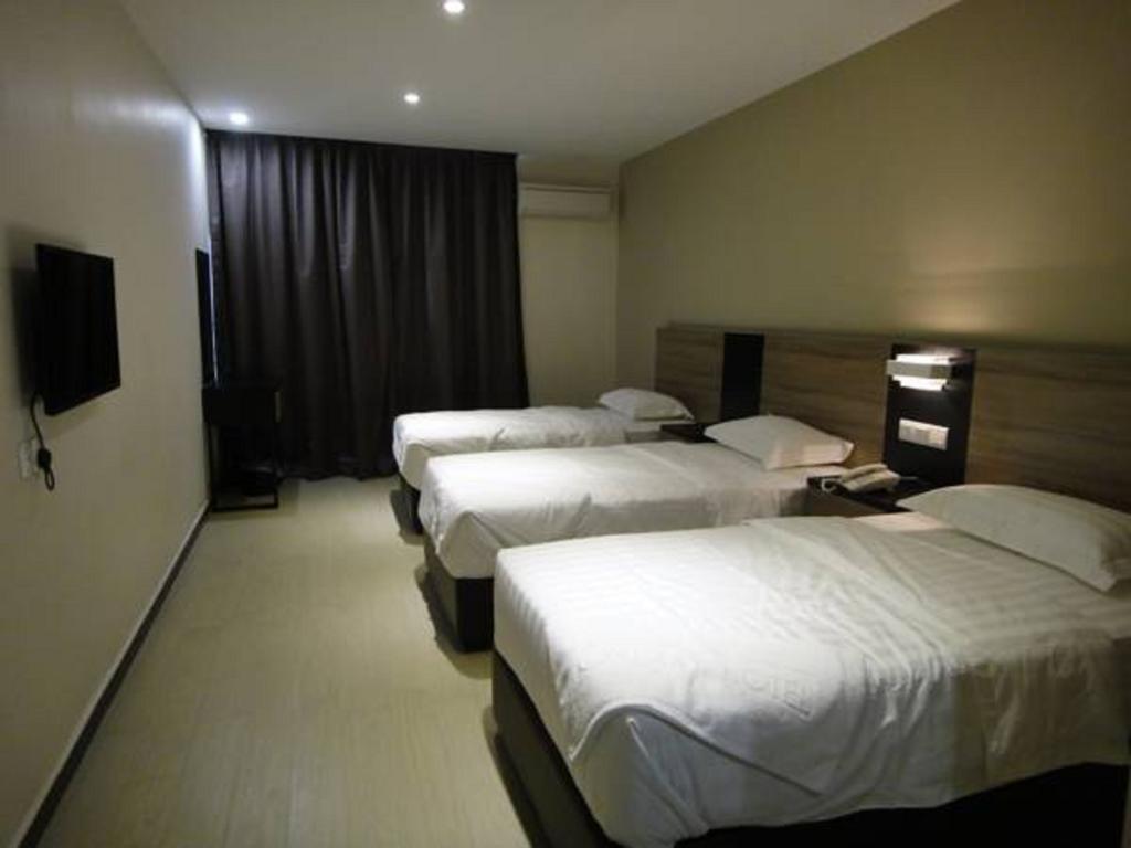 Galaxy Hotel Simpang Ampat  Δωμάτιο φωτογραφία