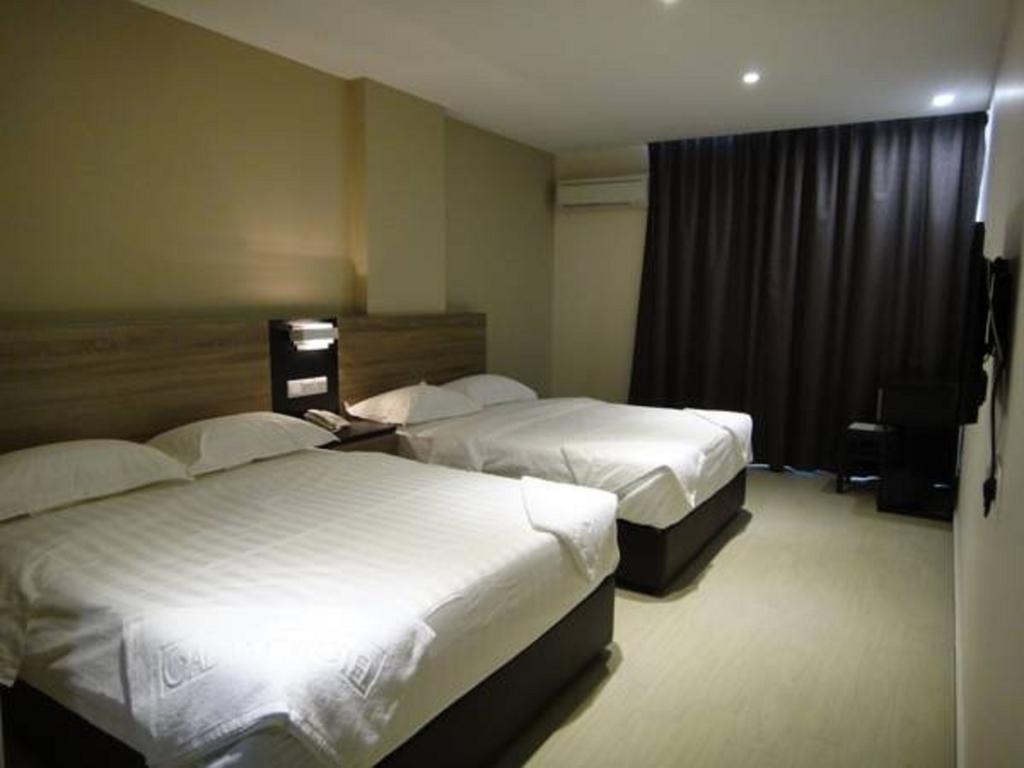 Galaxy Hotel Simpang Ampat  Δωμάτιο φωτογραφία